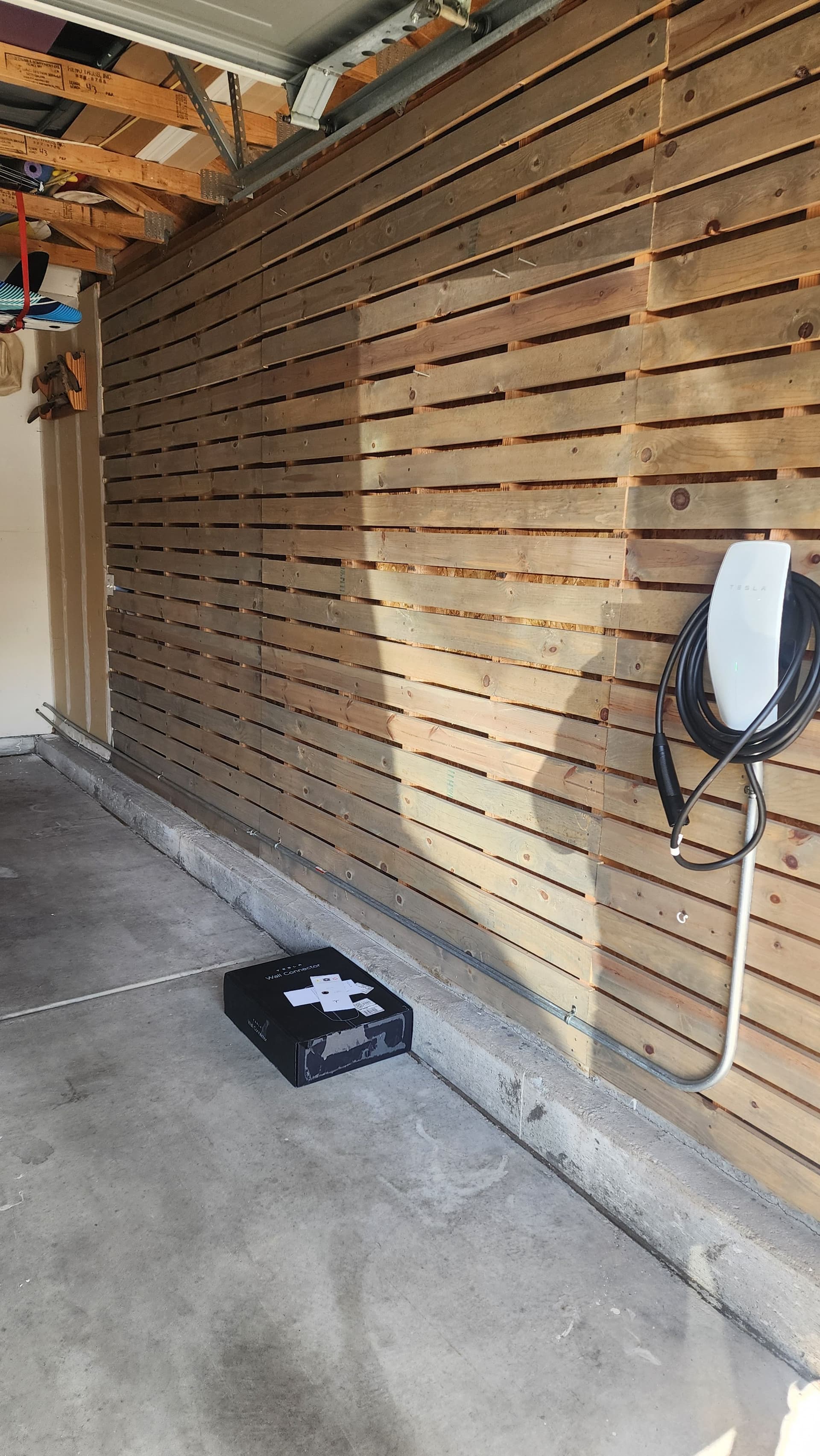 Gallery photos for Tesla Wall Connector Installed Clean Through the Crawl Space: Image #1