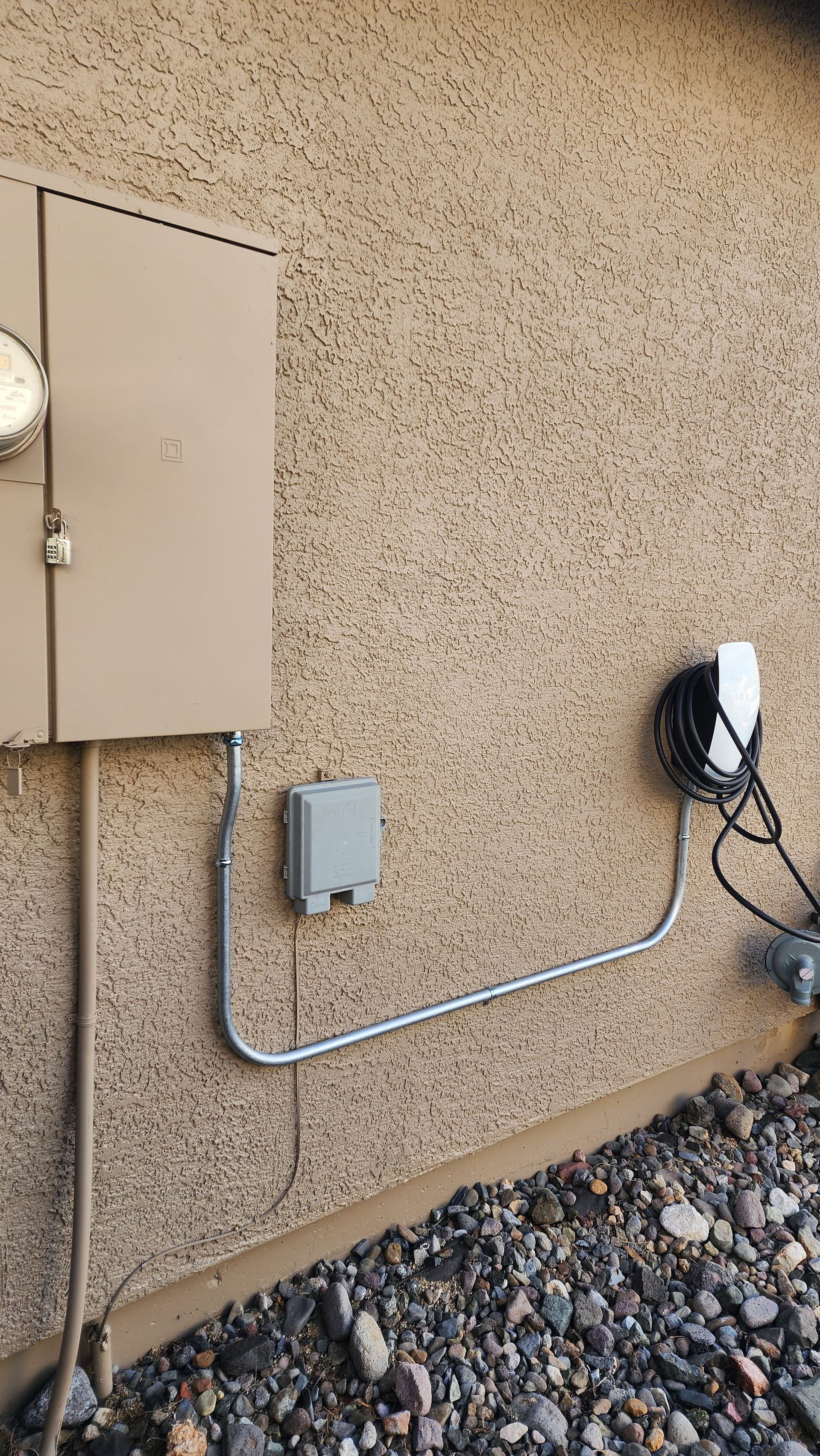 Gallery photos for Tesla Wall Connector Installed on Garage Exterior: Image #1