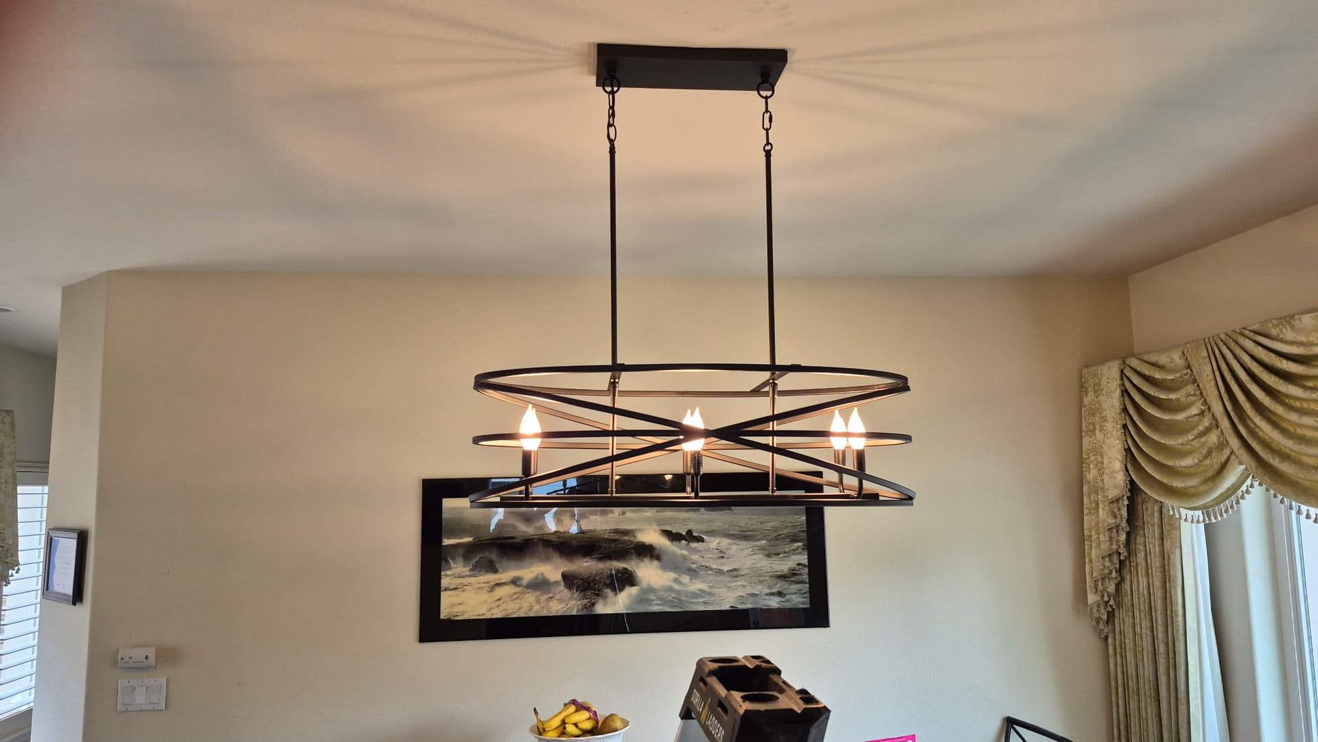 Gallery photos for Old Brass Chandelier Swapped for a Sleek Modern Fixture: Image #2