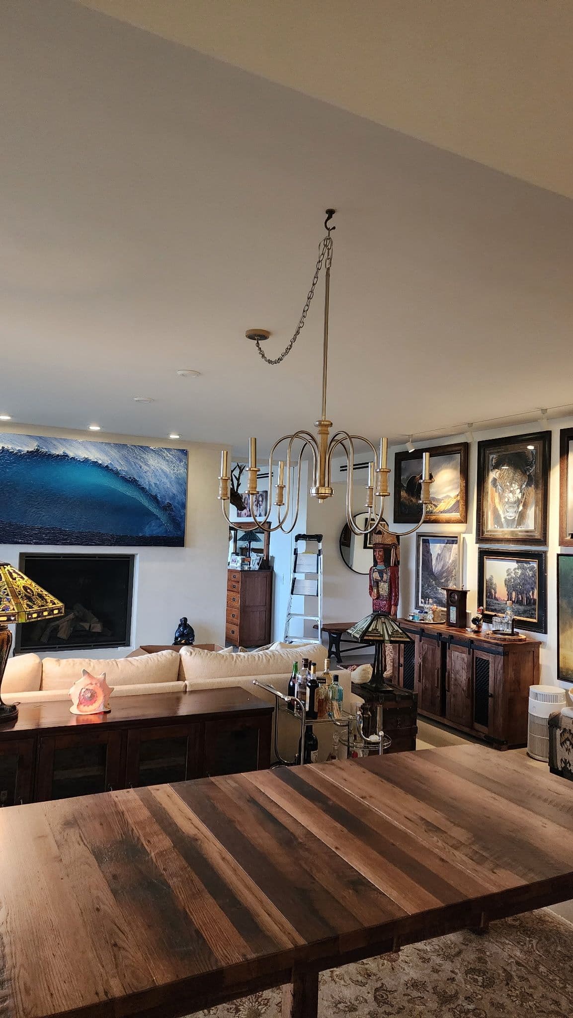Gallery photos for Elegant Chandelier Installation in a Cozy Home: Image #1