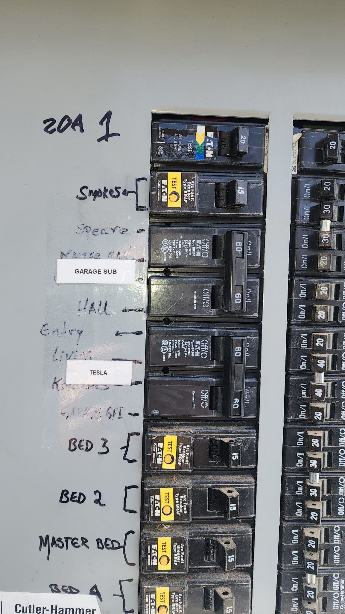 Seamless Tesla Charger Installation with Panel Upgrade image