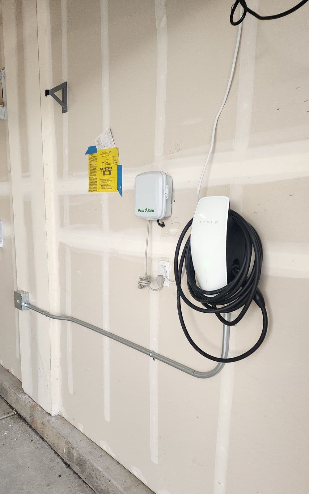 Enhanced Home Convenience with Universal Tesla Wall Connector Installation image